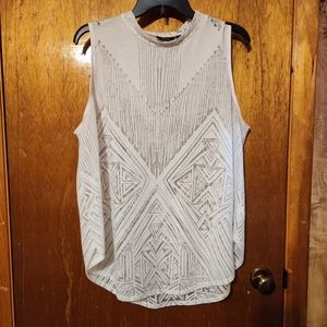 Sleeveless tank blouse with sheer design